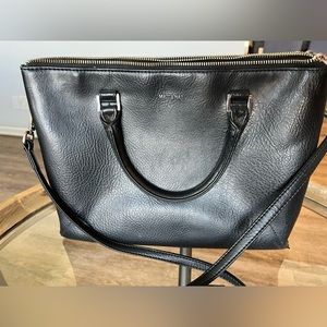 Matt & Nat Black purse with 3 zippered compartments. Very good condition.